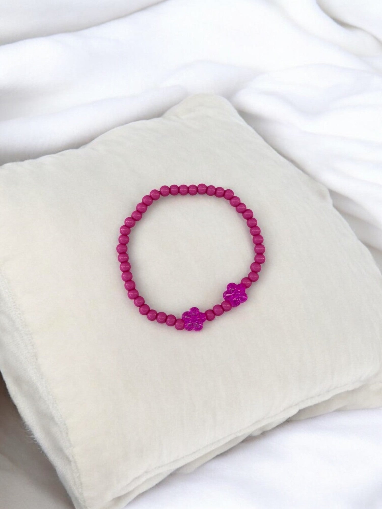 Bracelet enfant deux fleurs rose foncé