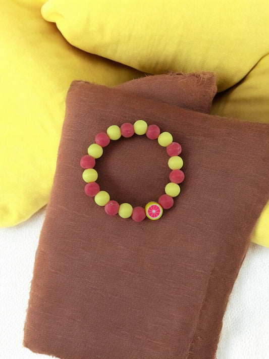 Bracelet enfant mélange perles jaune rose foncé pamplemousse