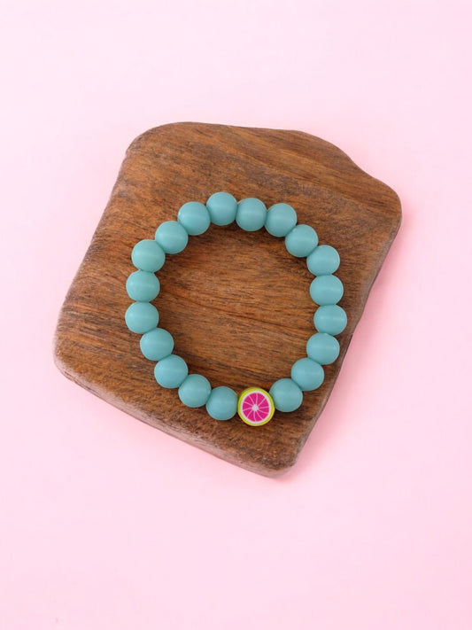 Bracelet enfant perles bleu clair pamplemousse