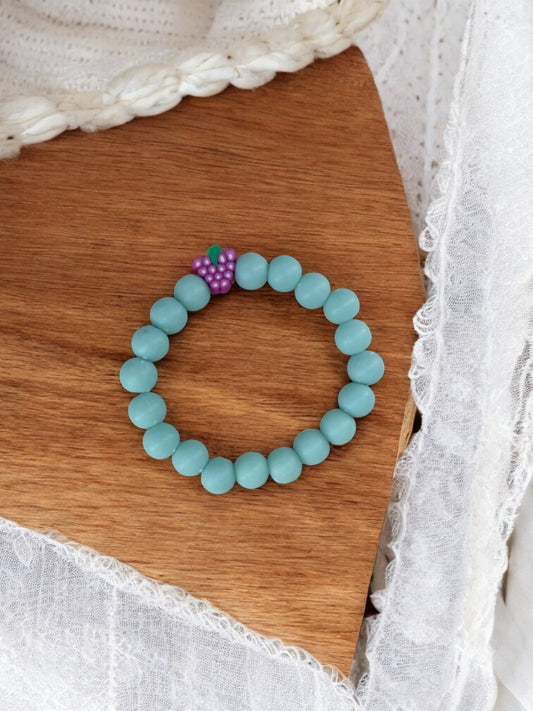 Bracelet enfant perles bleu clair raisin