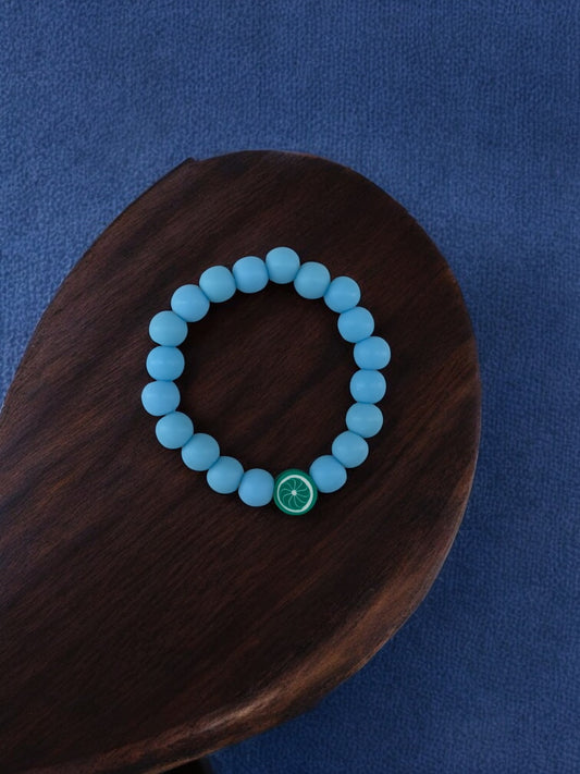 Bracelet enfant perles bleu foncé citron vert