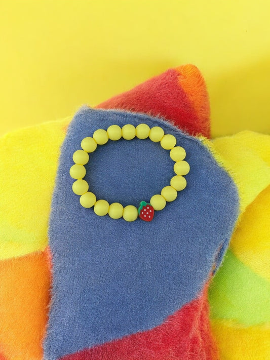 Bracelet enfant perles jaune fraise
