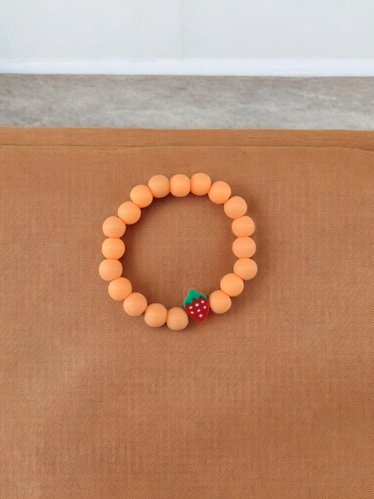 Bracelet enfant perles orange fraise