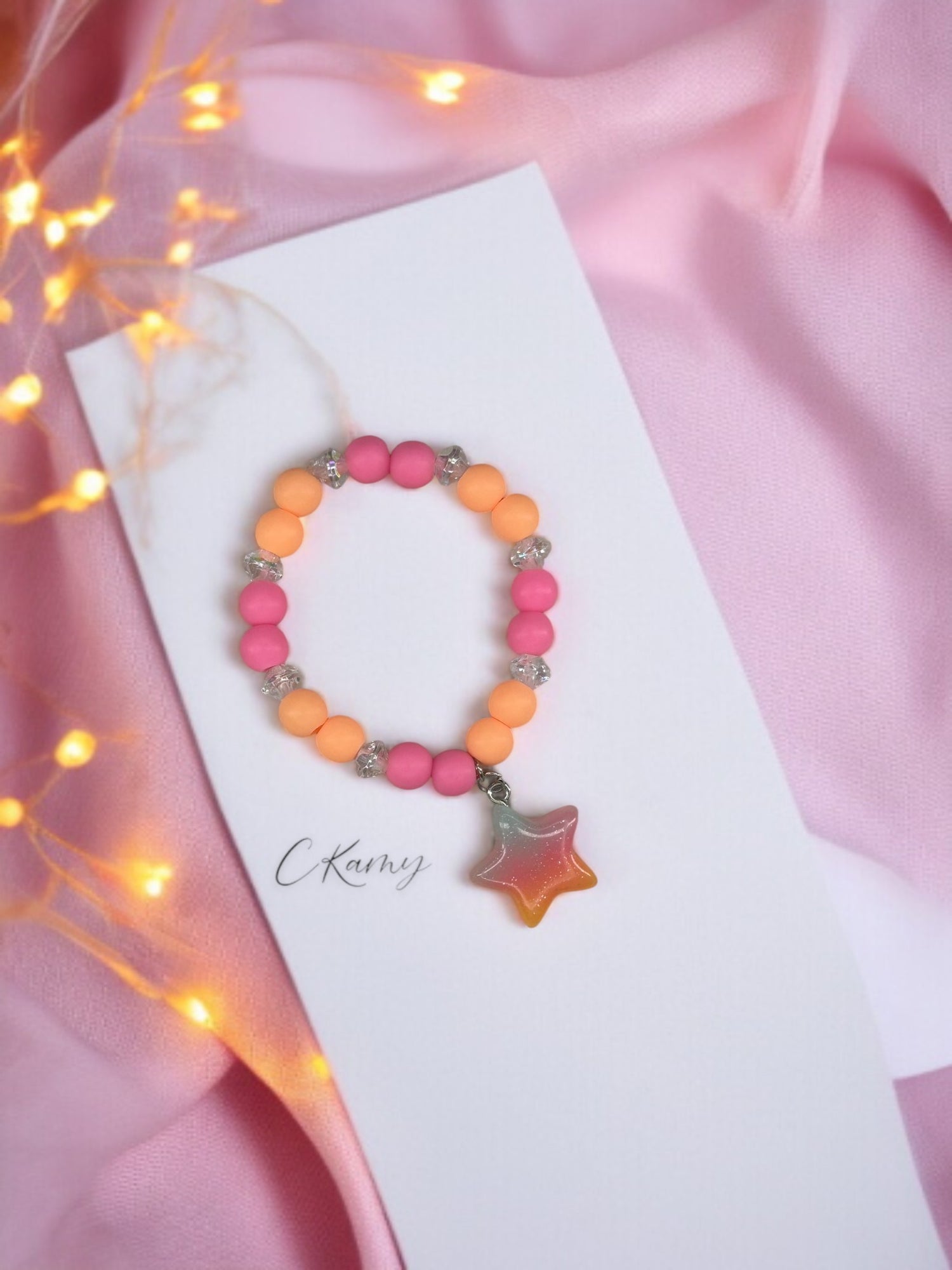 Bracelet enfant perles orange rose brillant