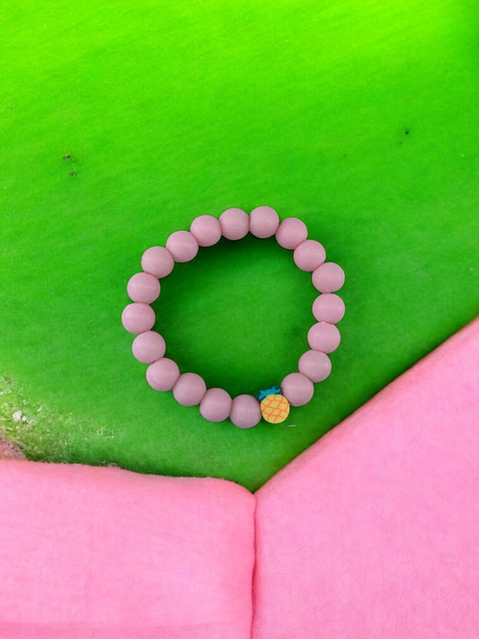Bracelet enfant perles rose clair ananas