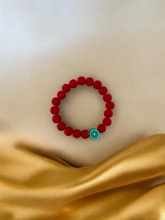 Bracelet enfant perles rouge citron vert