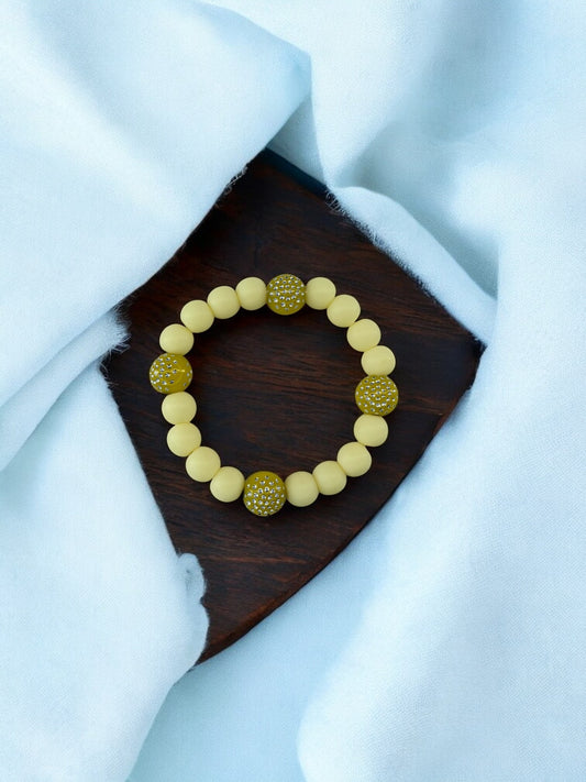 Bracelet enfant perles strassées jaune clair
