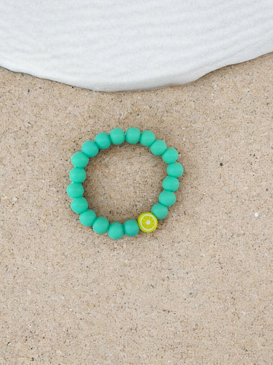 Bracelet enfant perles vert foncé citron