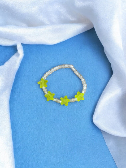 Bracelet enfant petites étoiles jaune fluo blanc transparent