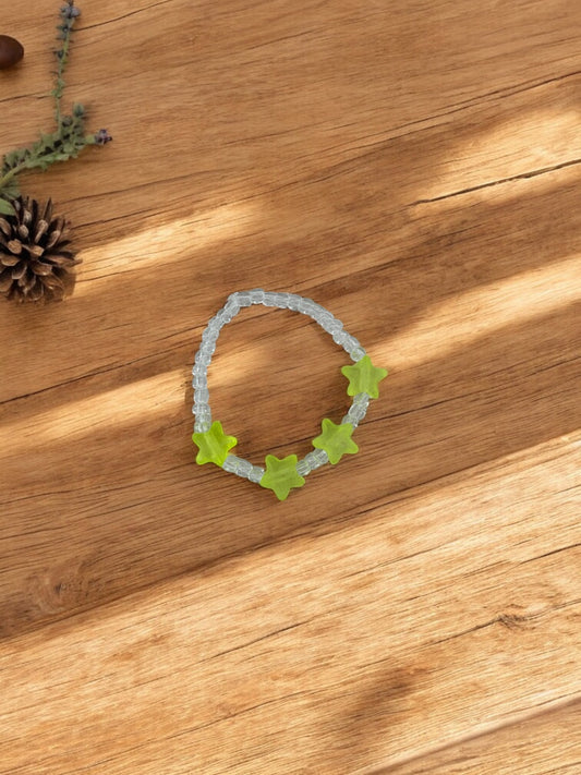 Bracelet enfant petites étoiles jaune fluo transparent