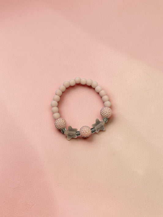 Bracelet enfant petites étoiles rose clair brillant
