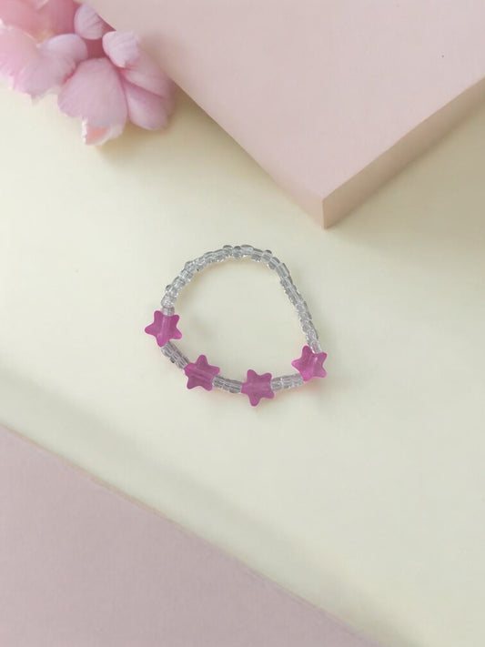 Bracelet enfant petites étoiles rose foncé transparent