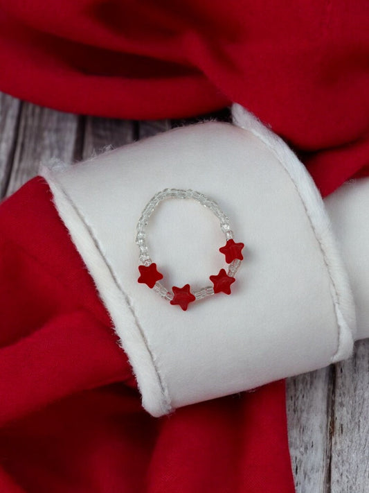 Bracelet enfant petites étoiles rouge transparent