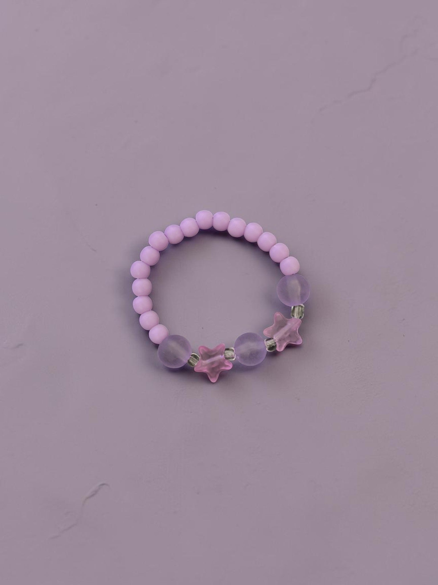 Bracelet enfant petites étoiles violet mat