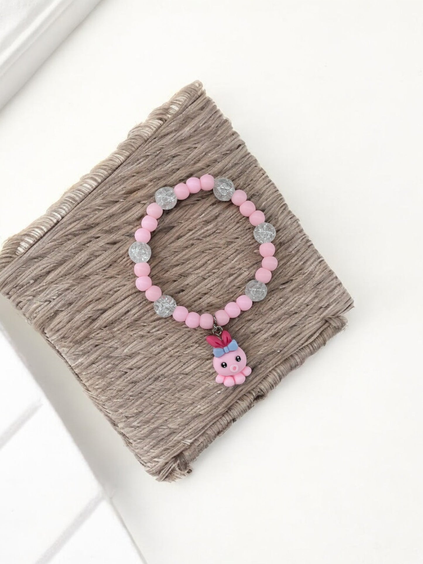 Bracelet enfant pieuvre rose brillant