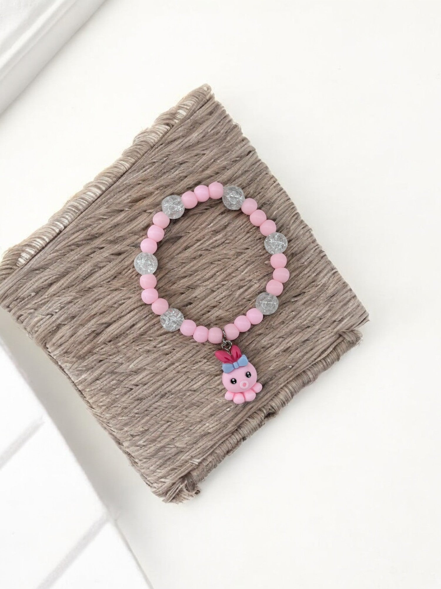 Bracelet enfant pieuvre rose brillant