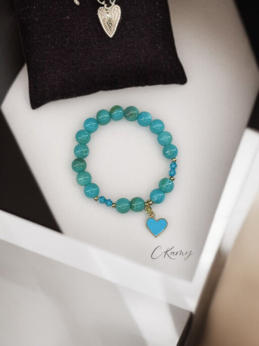 Bracelet enfant toupies & coeur bleu