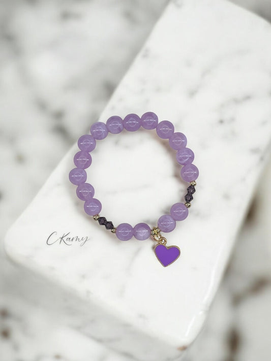 Bracelet enfant toupies & coeur violet