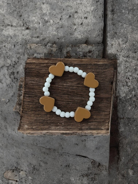 Bracelet enfant tour en coeur beige
