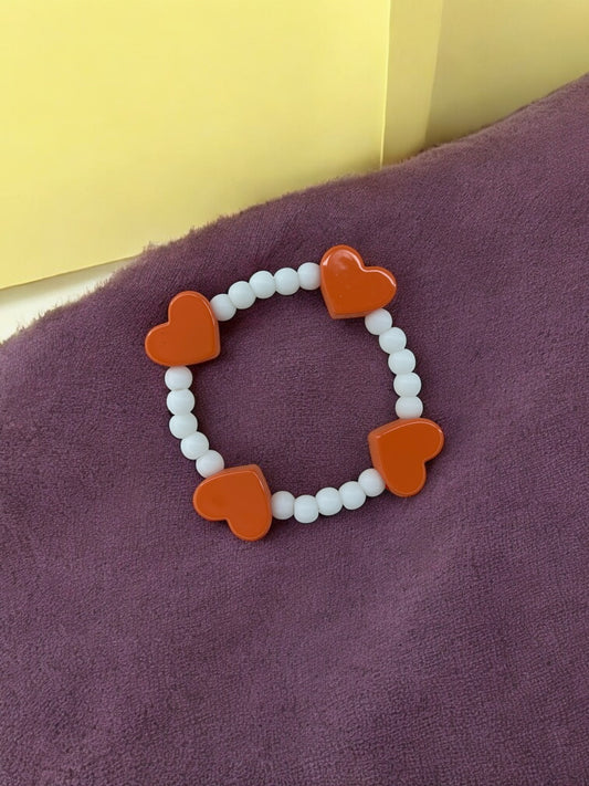 Bracelet enfant tour en coeur orange