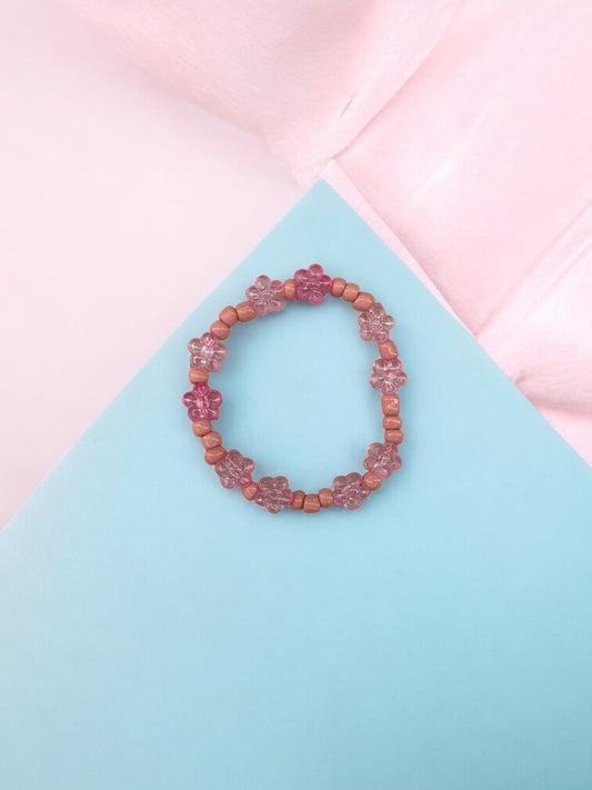 Bracelet enfant tour fleurs rose clair