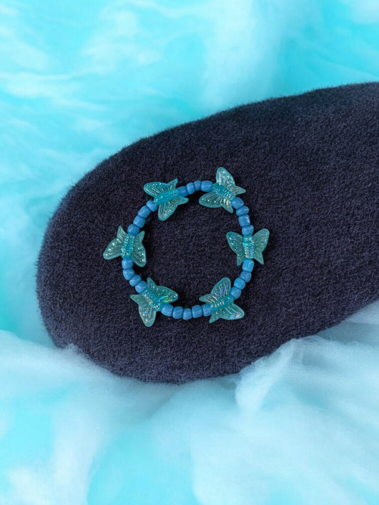 Bracelet enfant tour papillon bleu ciel