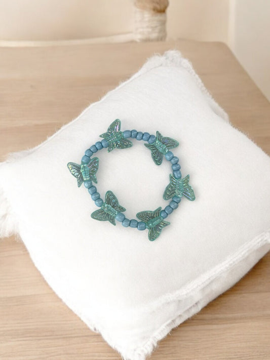 Bracelet enfant tour papillon bleu pastel