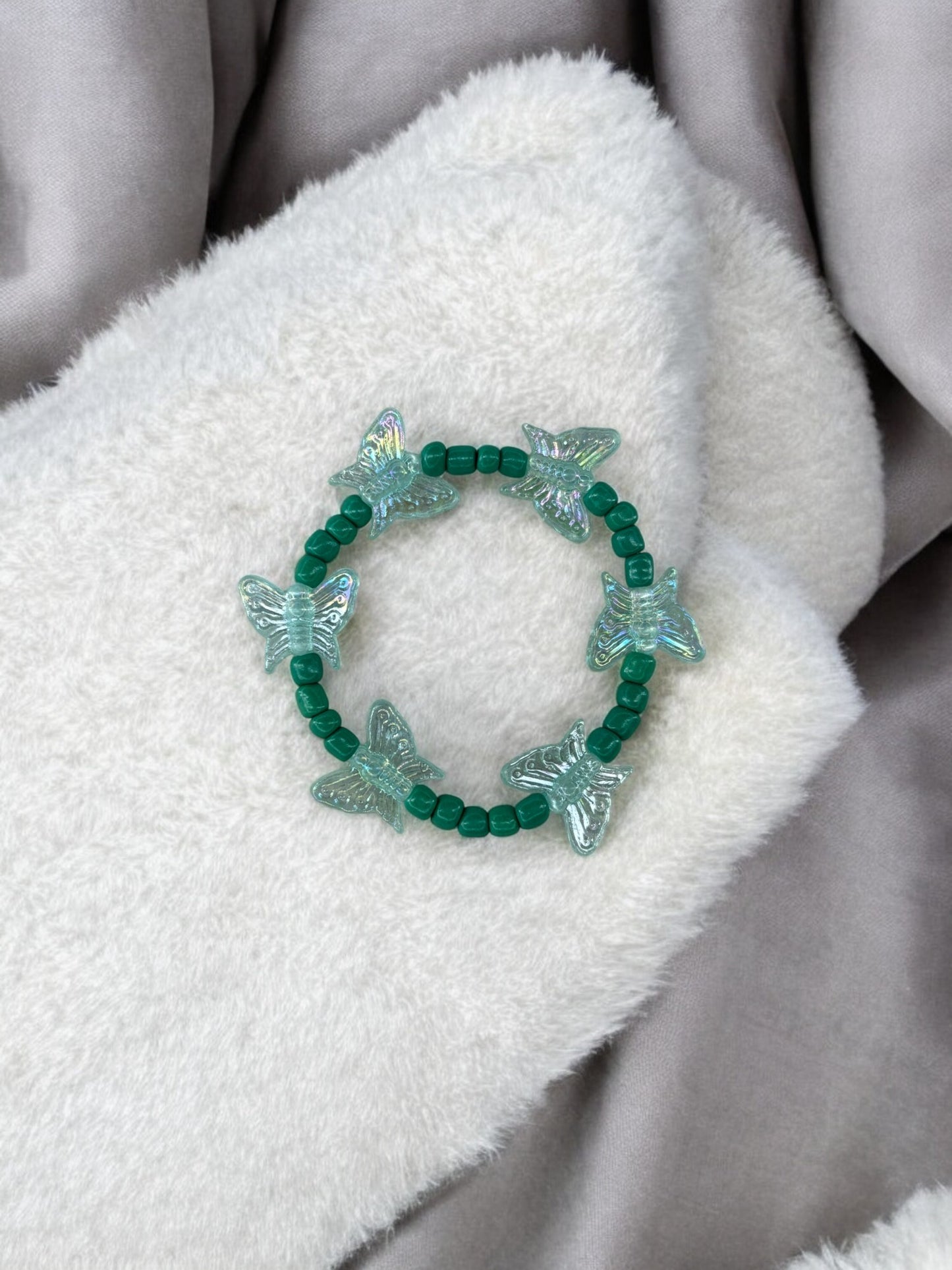 Bracelet enfant tour papillon bleu vert