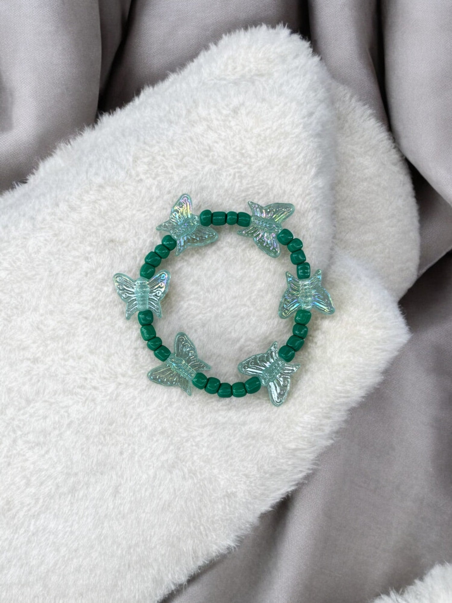 Bracelet enfant tour papillon bleu vert