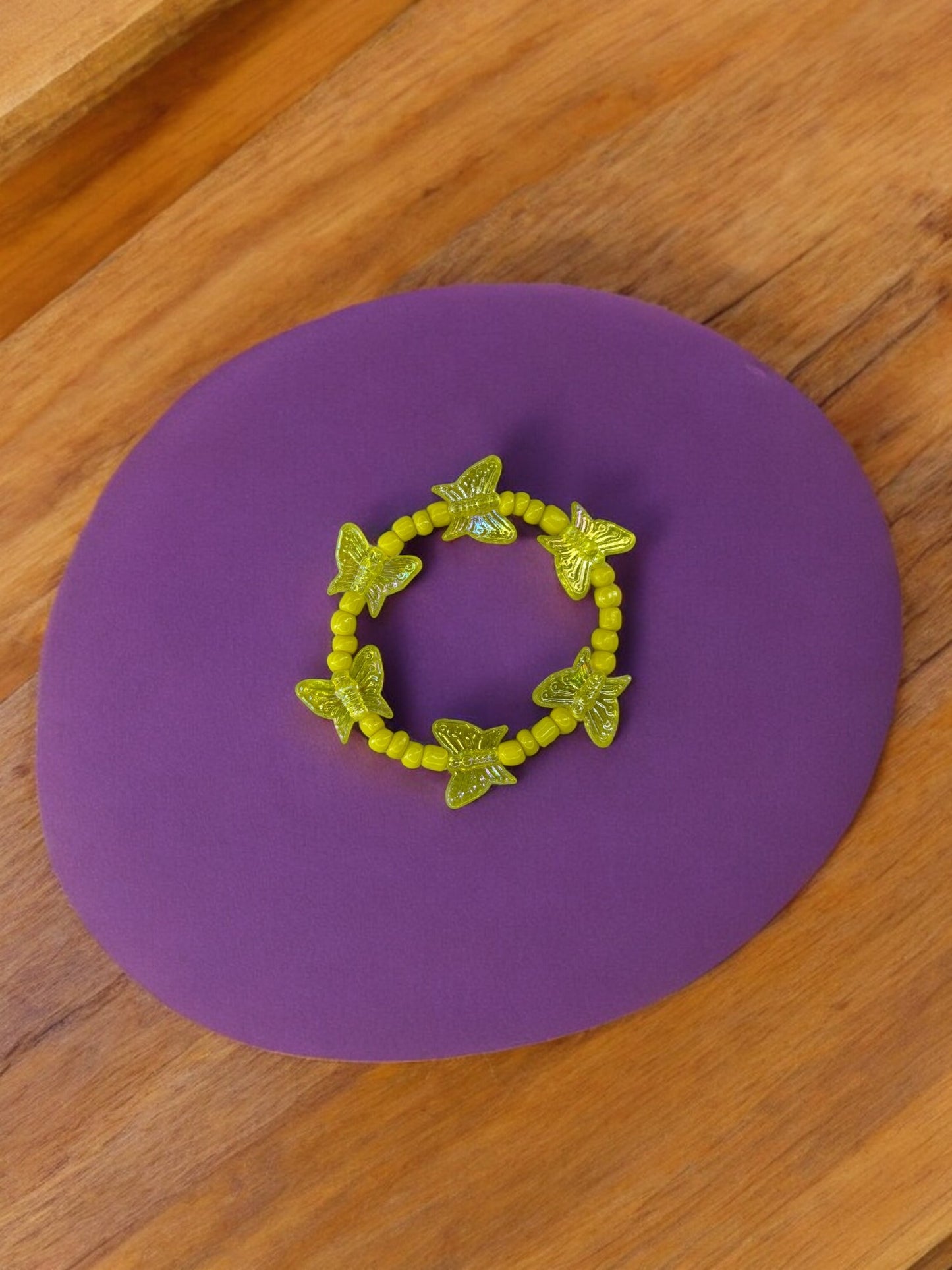 Bracelet enfant tour papillon jaune