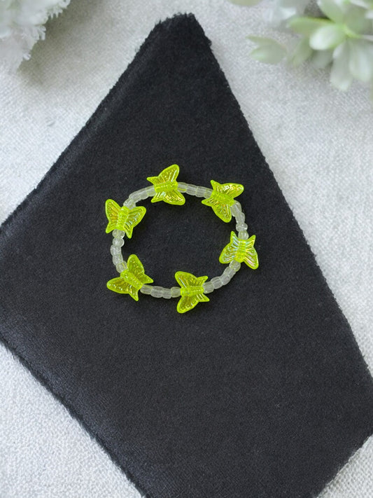 Bracelet enfant tour papillon jaune fluo