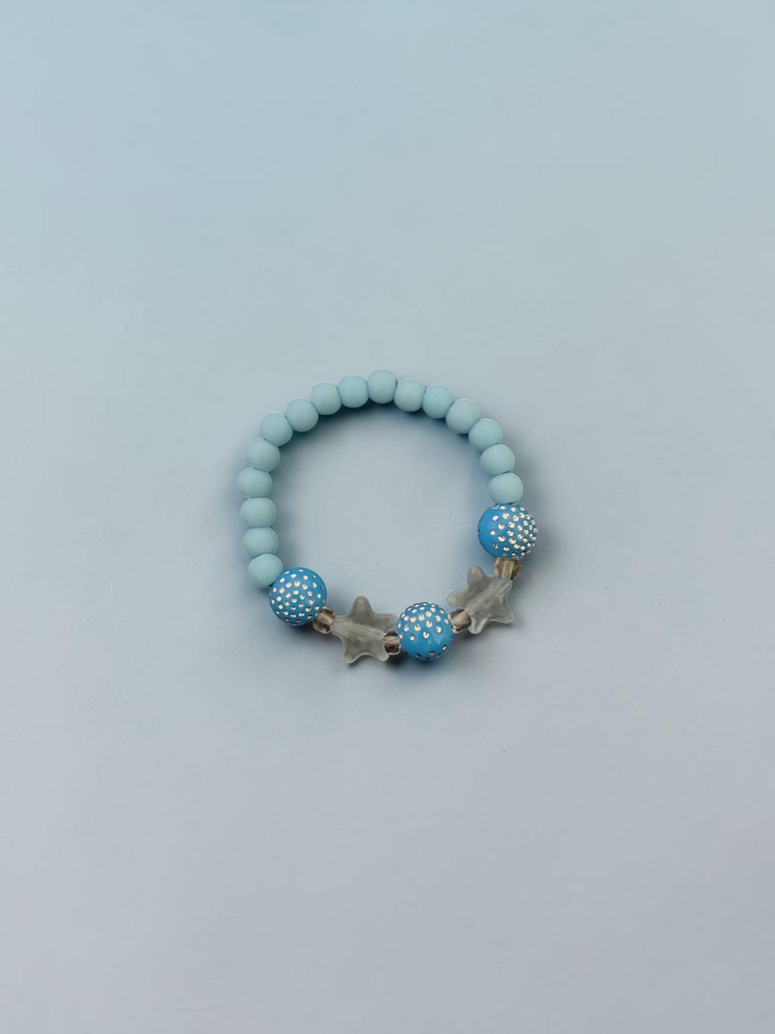 Bracelet enfants petites étoiles bleu clair brillant
