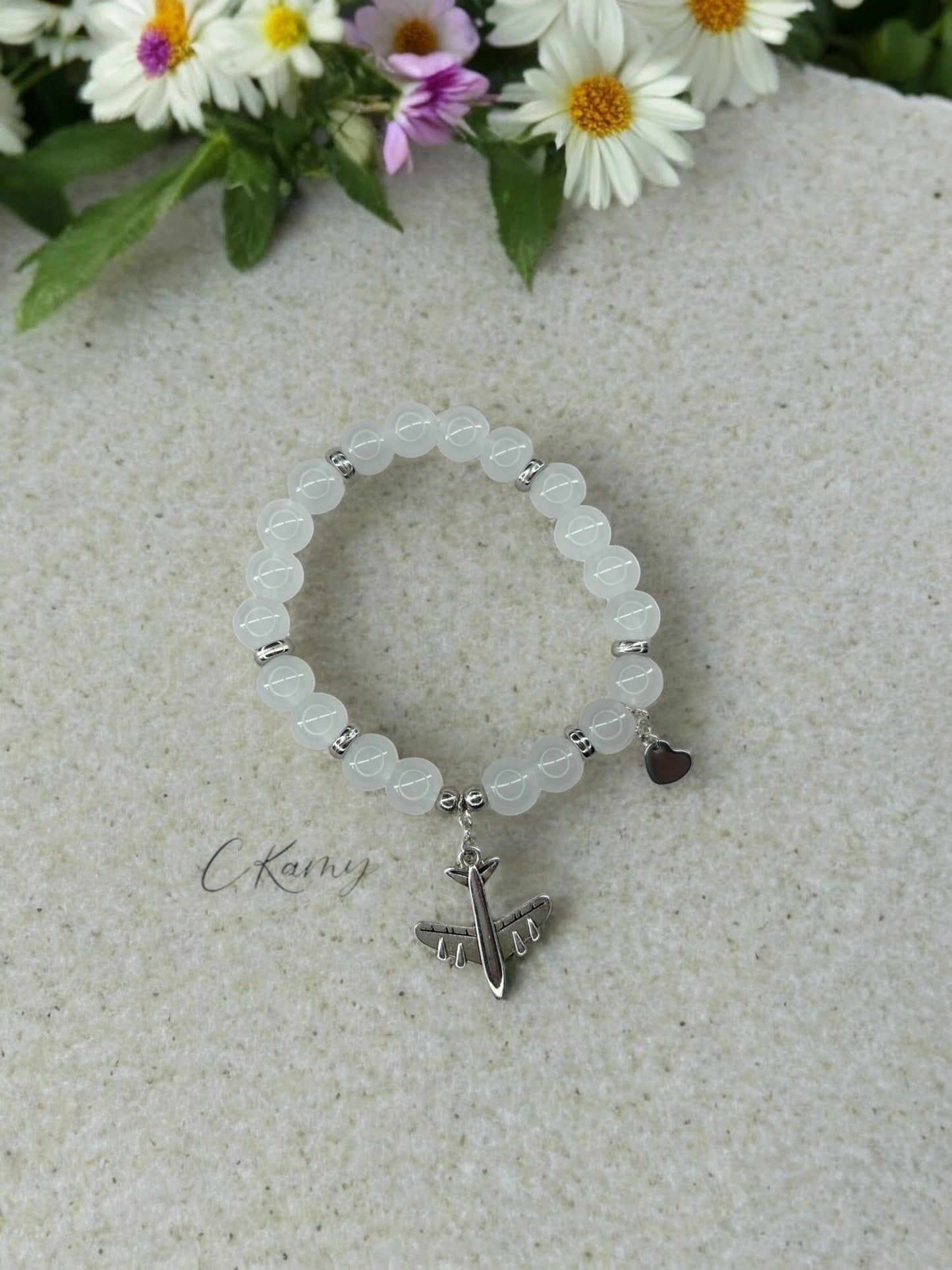 Bracelet femme avion argent blanc