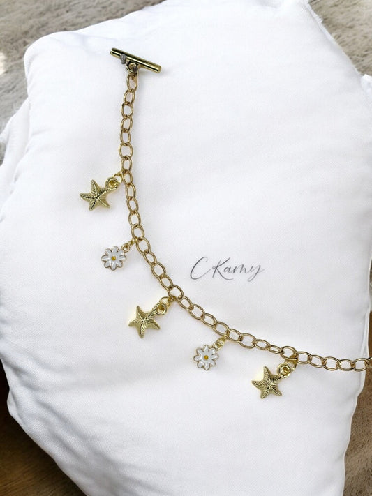 Bracelet femme chaîne étoile de mer et marguerite