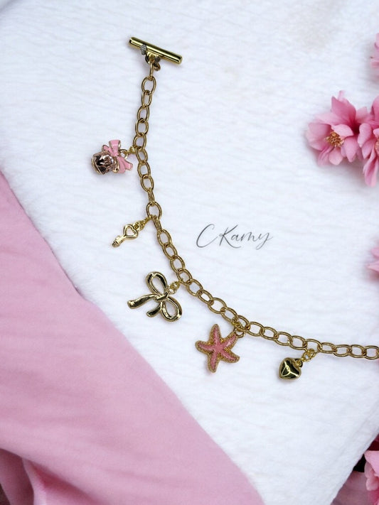 Bracelet femme chaîne étoile de mer parfum rose