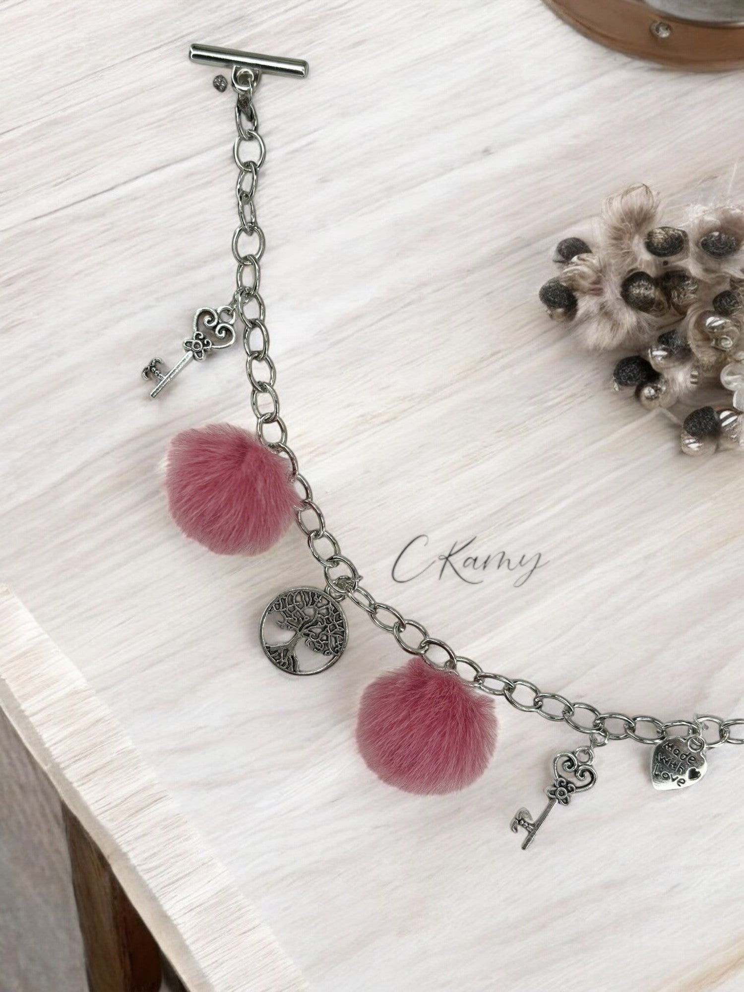 Bracelet femme chaîne moumoute rose fuchsia