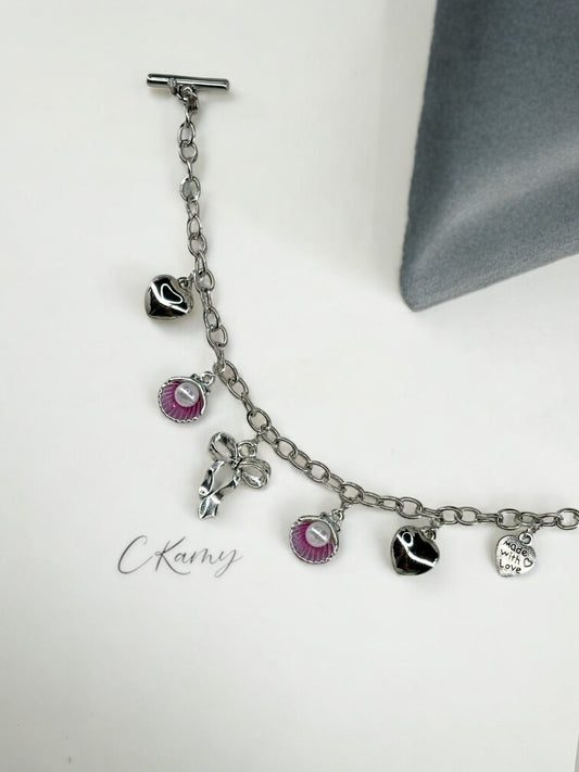 Bracelet femme chaîne noix de saint jacques rose