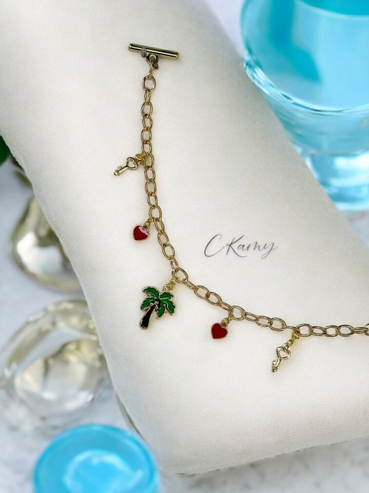Bracelet femme chaîne palmiers coeur rouge