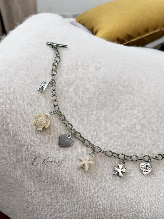 Bracelet femme chaîne tortue étoile de mer blanc et trèfle