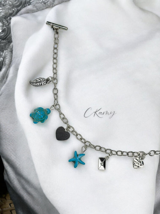 Bracelet femme chaîne tortue étoile de mer bleu et feuille