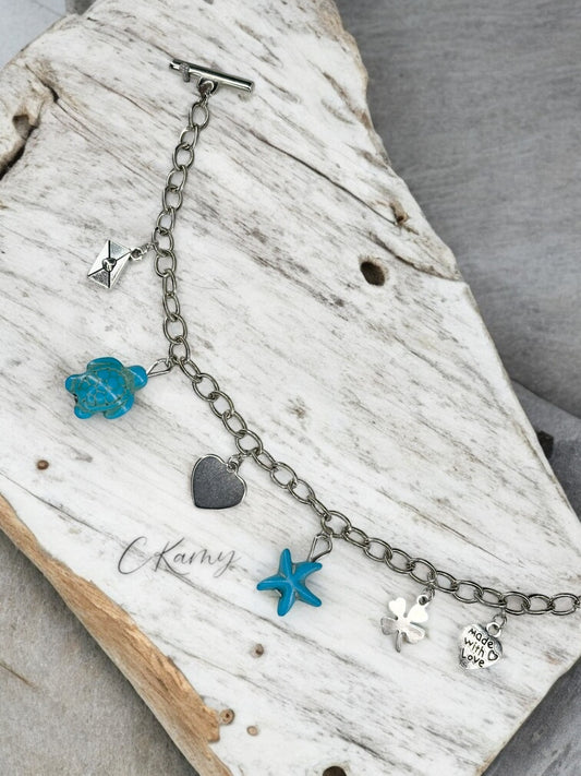 Bracelet femme chaîne tortue étoile de mer bleu et trèfle
