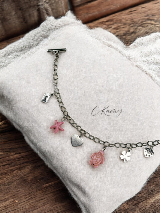 Bracelet femme chaîne tortue étoile de mer rose et trèfle