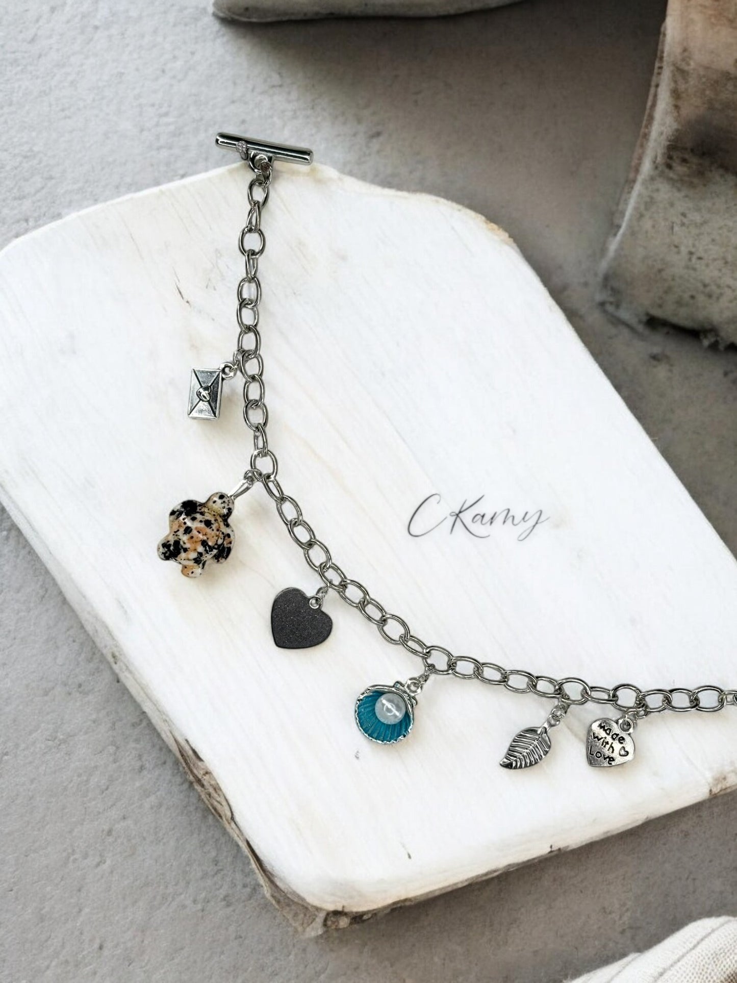 Bracelet femme chaîne tortue noir noix de saint jacques bleu