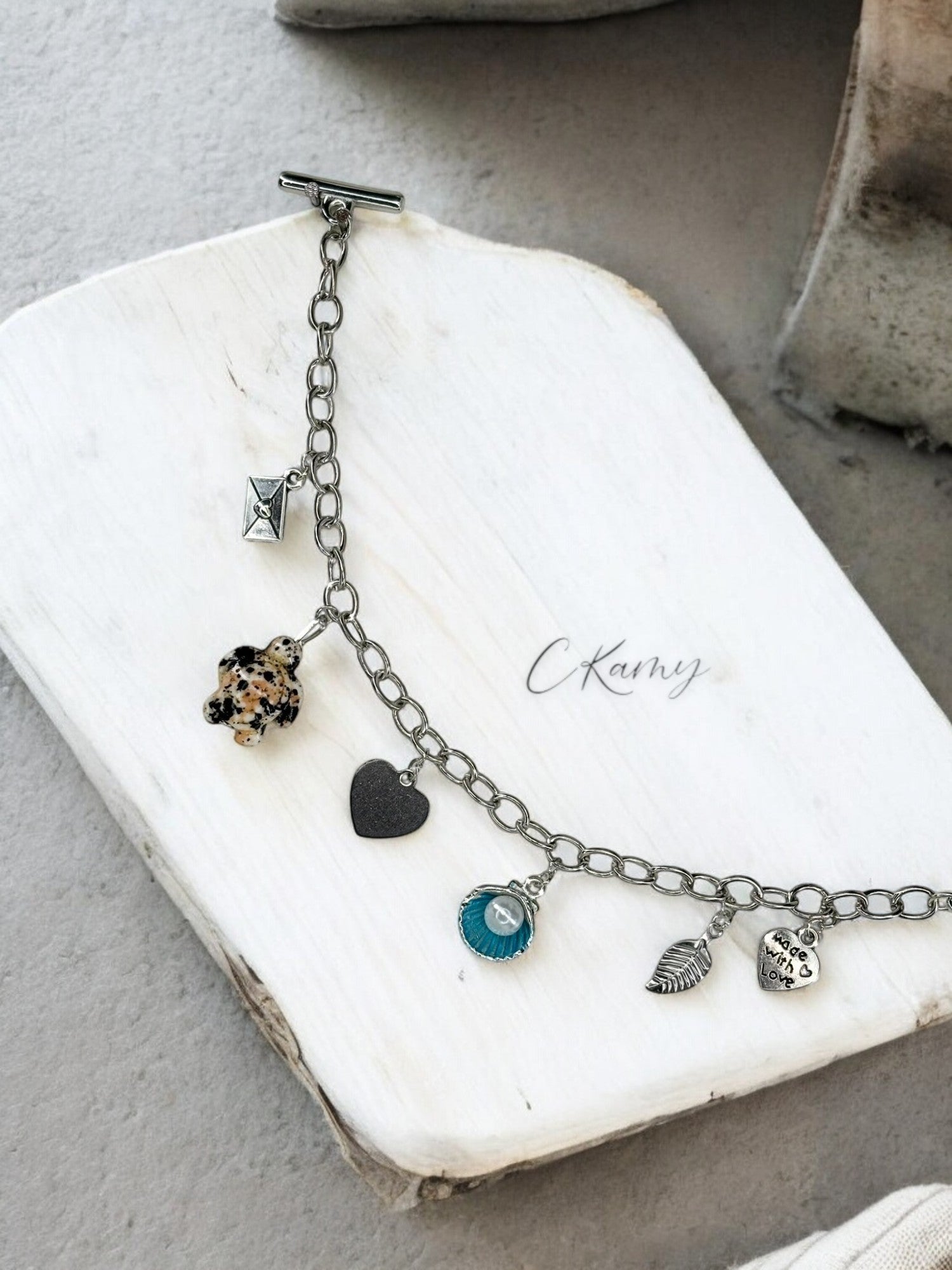 Bracelet femme chaîne tortue noir noix de saint jacques bleu