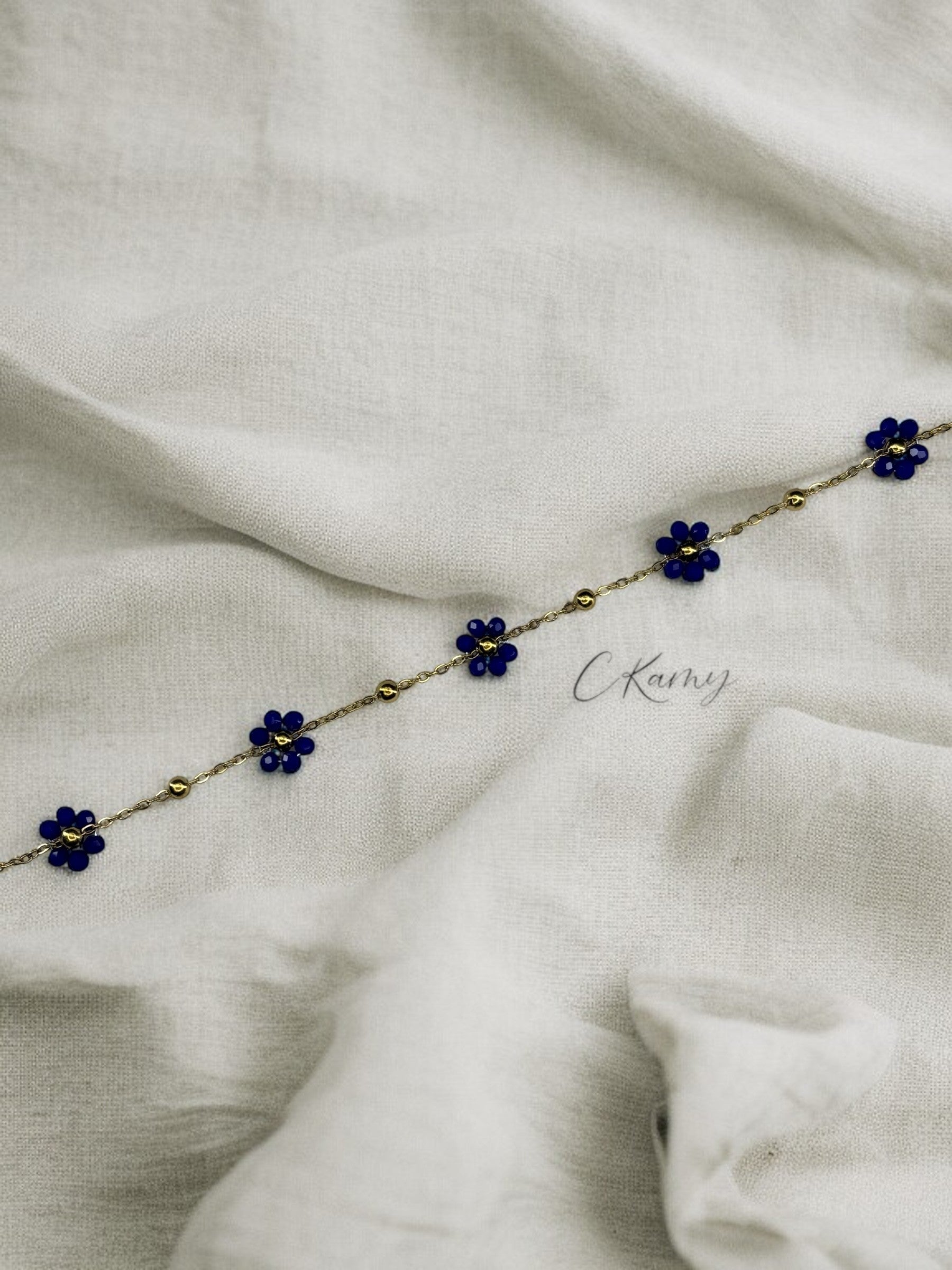 Bracelet femme chaînette doré fleurs bleu foncé
