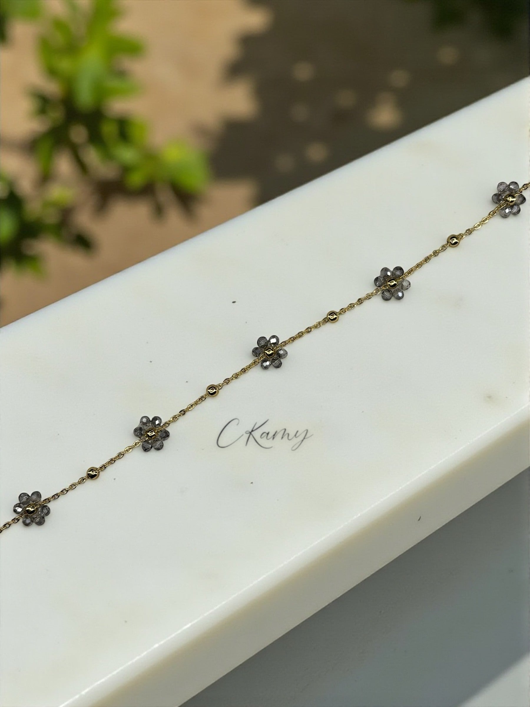 Bracelet femme chaînette doré fleurs gris