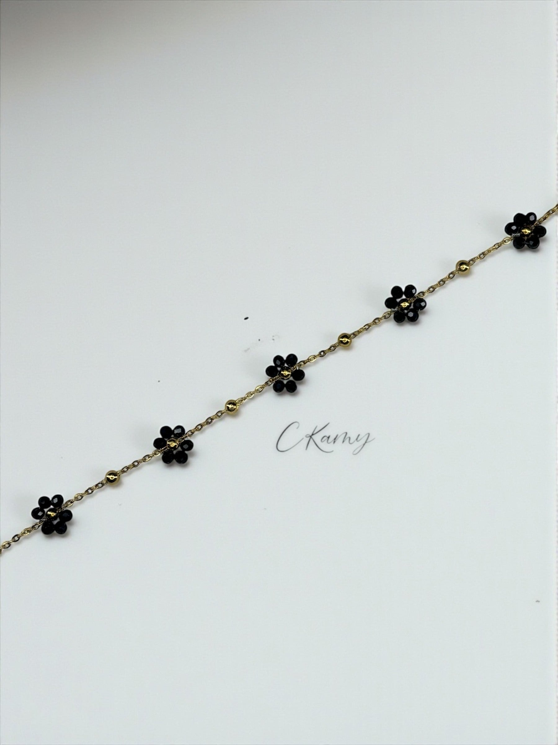 Bracelet femme chaînette doré fleurs noir