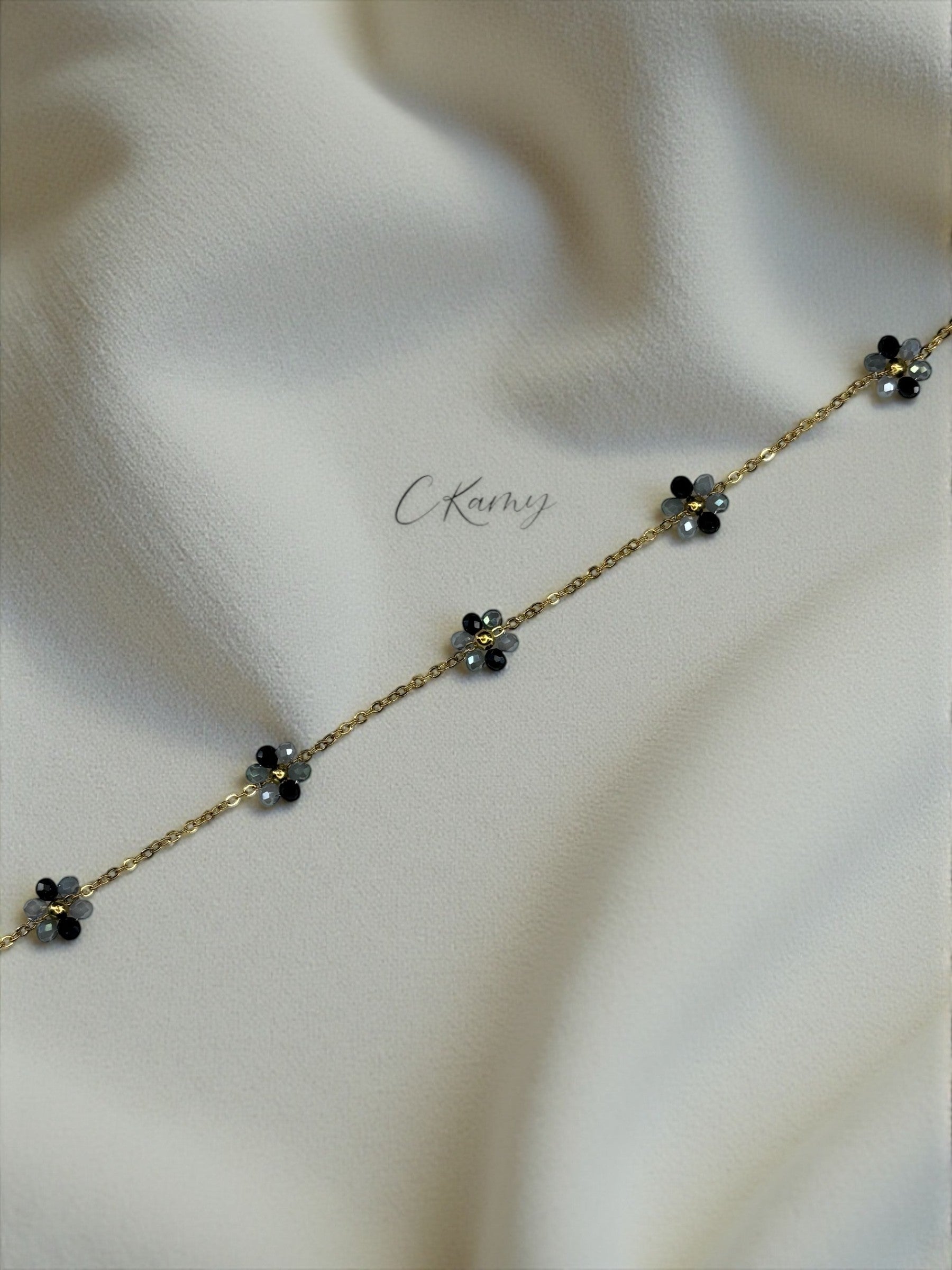 Bracelet femme chaînette doré fleurs noir gris