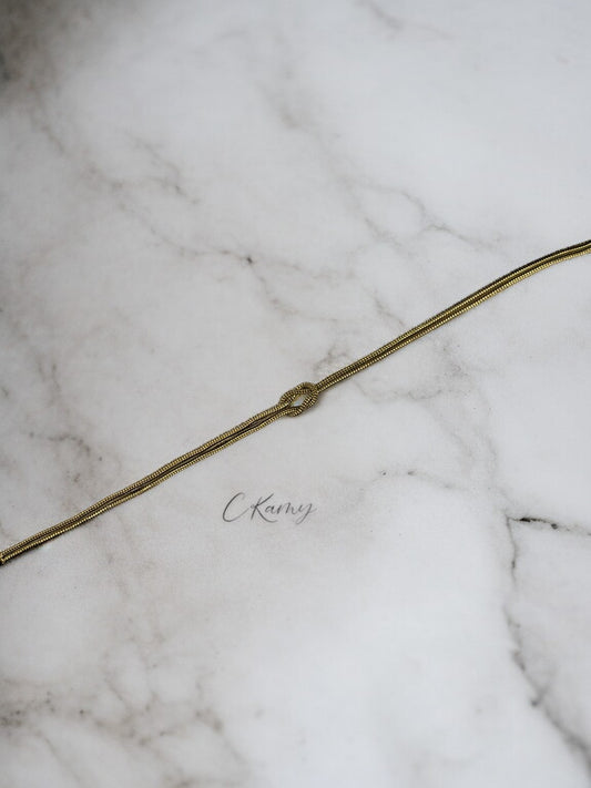 Bracelet femme chaînette doré noeud