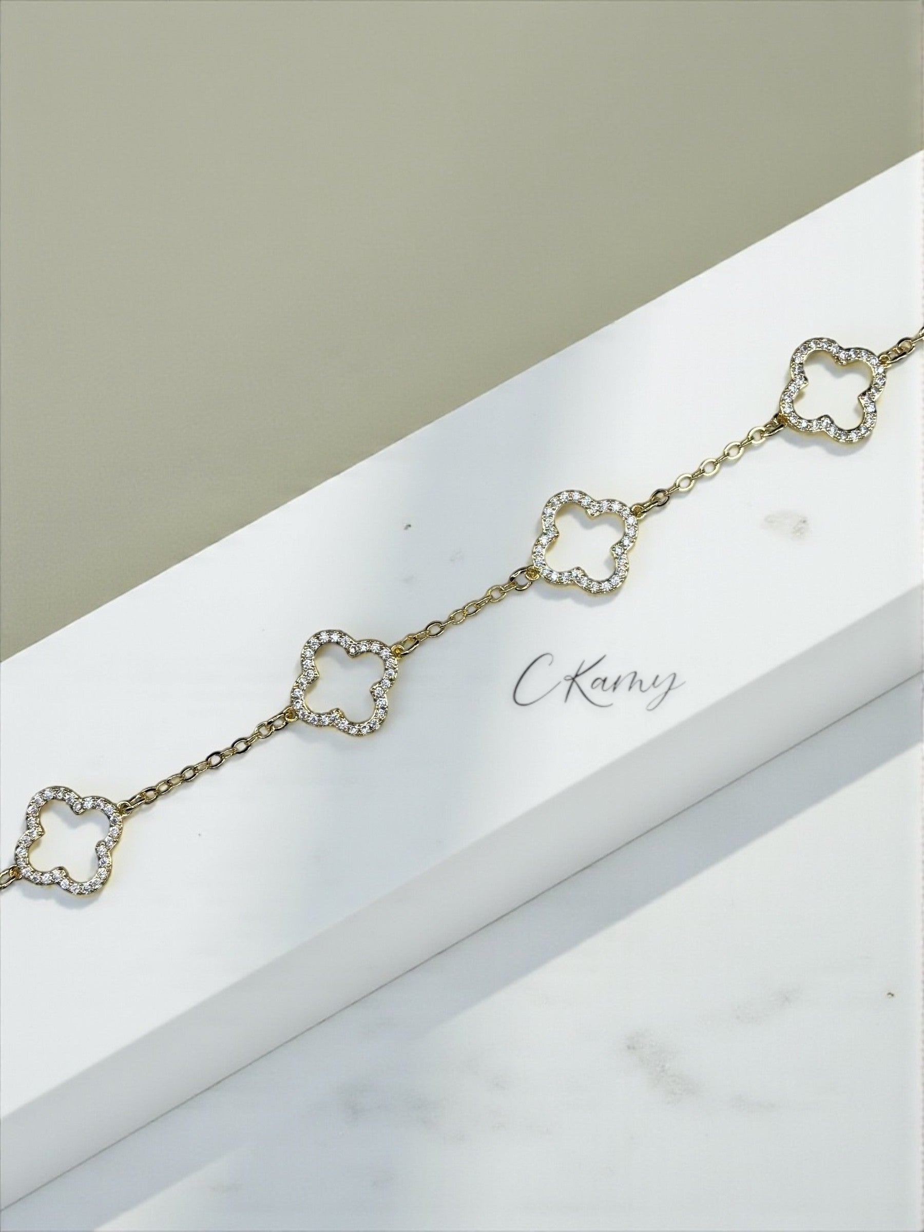 Bracelet femme chaînette doré trèfles doré strass